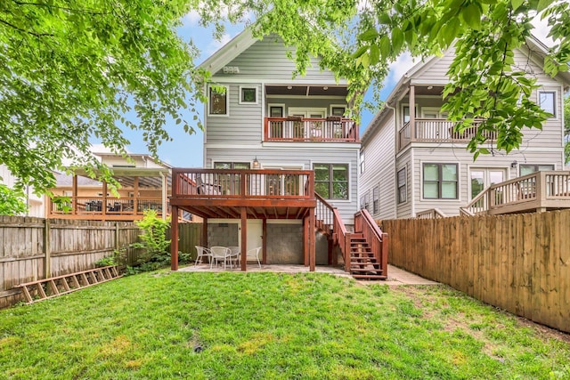 525B Stevenson St, Nashville, TN 37209 - back of property with stairs, a patio area, and a wooden deck