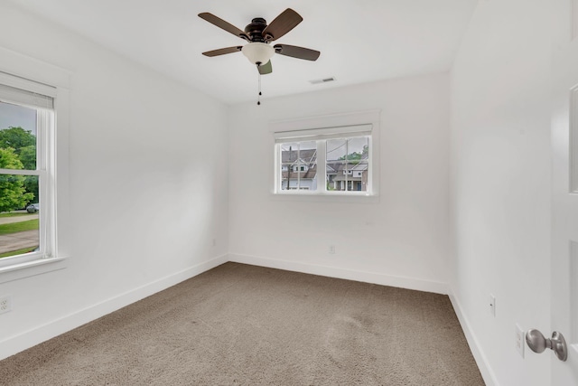525B Stevenson St, Nashville, TN 37209 - empty room with carpet, baseboards, and a ceiling fan