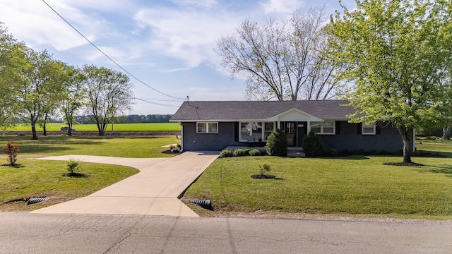 703 Brenda Ave, Loretto, TN 38469 - single story home featuring a front lawn and driveway