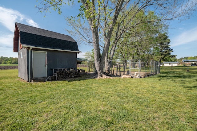 703 Brenda Ave, Loretto, TN 38469 - view of grassy yard featuring an outdoor structure