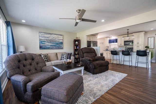 703 Brenda Ave, Loretto, TN 38469 - living room featuring dark wood finished floors, ceiling fan, recessed lighting, and baseboards