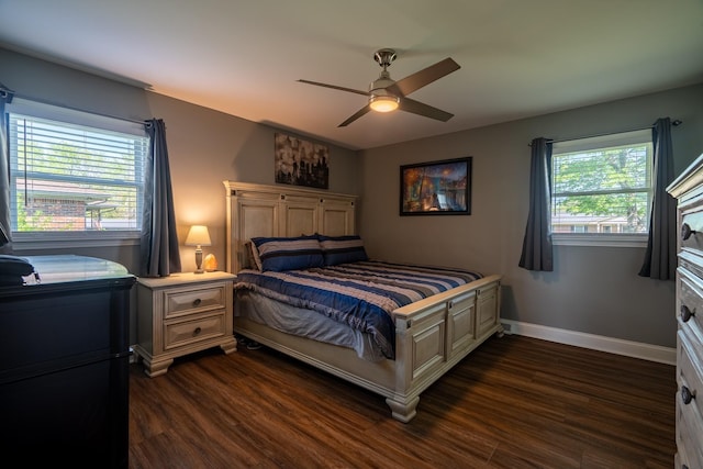 703 Brenda Ave, Loretto, TN 38469 - bedroom with dark wood-style flooring, baseboards, and a ceiling fan