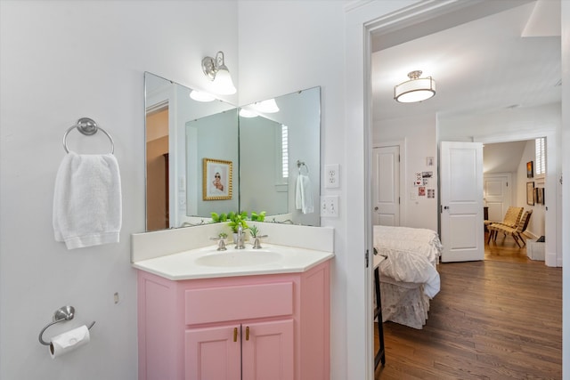 bathroom featuring vanity and wood finished floors