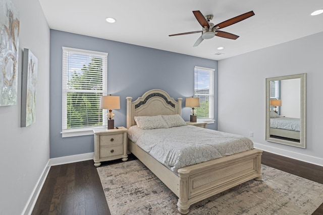 bedroom with baseboards, wood finished floors, recessed lighting, and ceiling fan