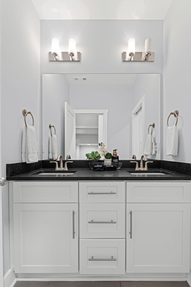 bathroom with double vanity