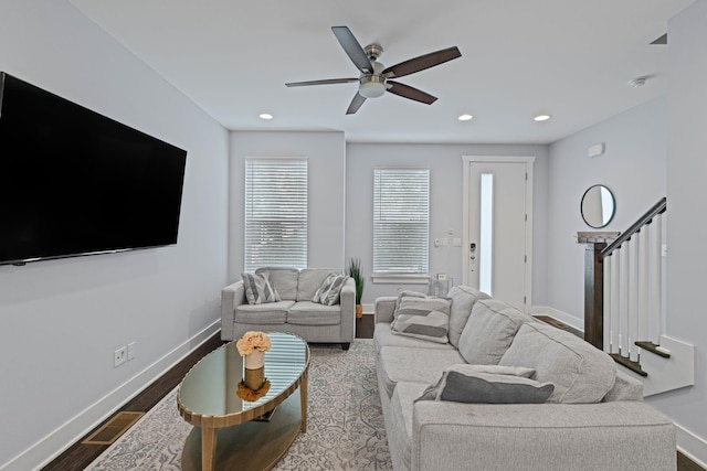 living area featuring dark wood finished floors, baseboards, ceiling fan, and recessed lighting