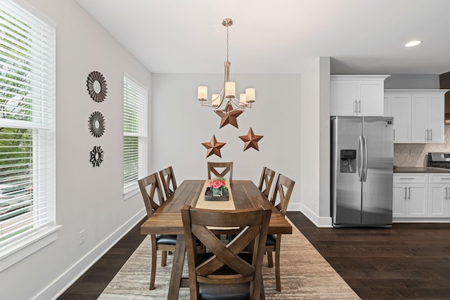 dining room featuring a chandelier, dark wood-style flooring, recessed lighting, and baseboards