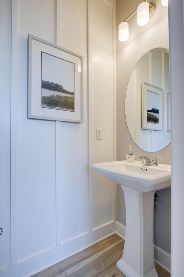 5211 Gladecress Ln, Hermitage, TN 37076 - bathroom with wood finished floors, baseboards, and a sink