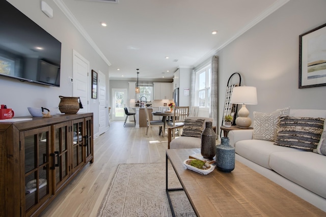 5211 Gladecress Ln, Hermitage, TN 37076 - living area featuring ornamental molding, light wood-type flooring, recessed lighting, and baseboards