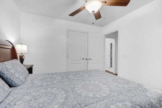 bedroom with a closet and a ceiling fan