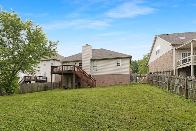 rear view of house with stairway, a wooden deck, a chimney, crawl space, and a shingled roof