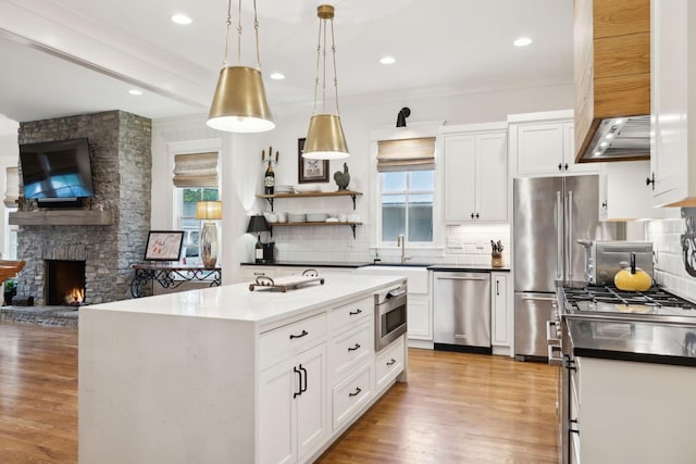 1224 Adams St, Franklin, TN 37064 - kitchen with high end appliances, a sink, hanging light fixtures, decorative backsplash, and recessed lighting