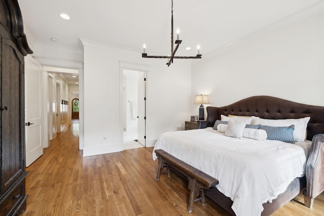 1224 Adams St, Franklin, TN 37064 - bedroom with ornamental molding, a chandelier, recessed lighting, light wood-type flooring, and baseboards