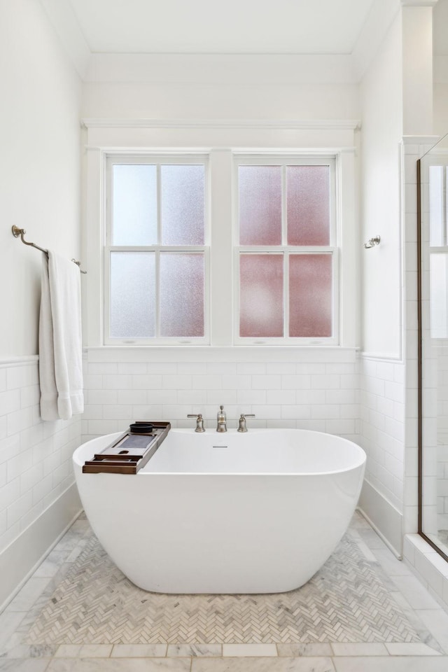 1224 Adams St, Franklin, TN 37064 - full bath with tile walls, a freestanding bath, a shower stall, and wainscoting
