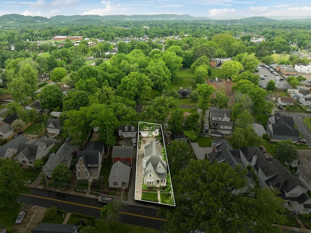 1224 Adams St, Franklin, TN 37064 - aerial view of residential area featuring property parcel outlined, a mountainous background, and a forest