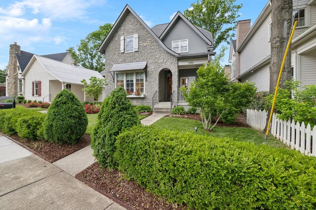 1224 Adams St, Franklin, TN 37064 - view of front of house with fence and stone siding
