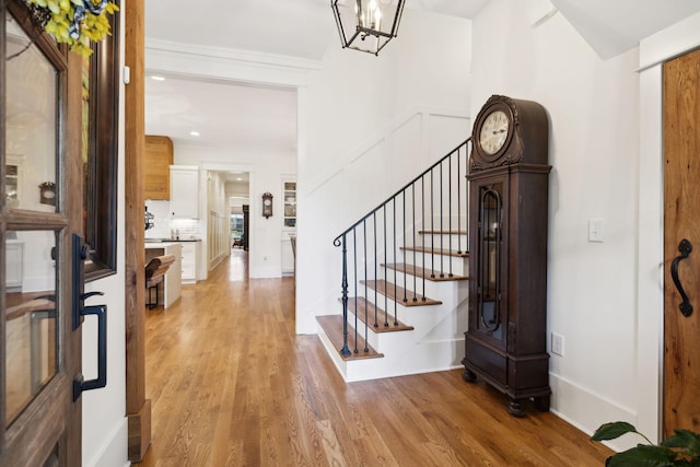 1224 Adams St, Franklin, TN 37064 - foyer entrance with light wood-style flooring, stairway, and recessed lighting