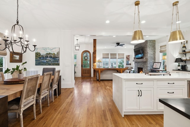 1224 Adams St, Franklin, TN 37064 - kitchen with a chandelier, plenty of natural light, ornamental molding, white cabinets, and recessed lighting