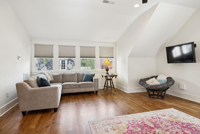 1224 Adams St, Franklin, TN 37064 - living area featuring wood finished floors, lofted ceiling, and baseboards