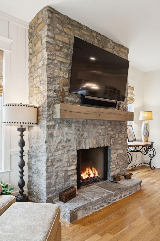 1224 Adams St, Franklin, TN 37064 - detailed view of a fireplace, wood finished floors, and crown molding