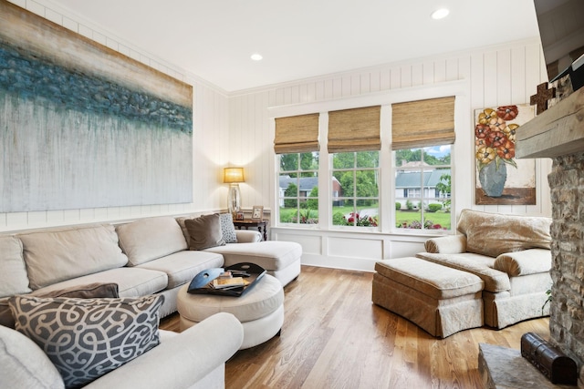 1224 Adams St, Franklin, TN 37064 - living room with wood finished floors, crown molding, a decorative wall, and recessed lighting
