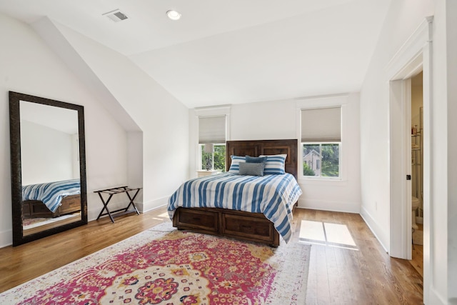 1224 Adams St, Franklin, TN 37064 - bedroom with wood finished floors, baseboards, and lofted ceiling