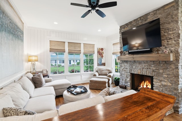 1224 Adams St, Franklin, TN 37064 - living room with wood finished floors, ceiling fan, a fireplace, crown molding, and a decorative wall