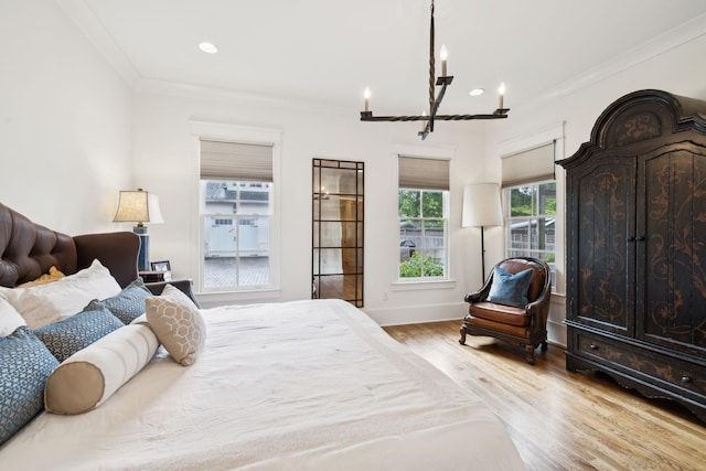 1224 Adams St, Franklin, TN 37064 - bedroom with a chandelier, wood finished floors, crown molding, recessed lighting, and baseboards