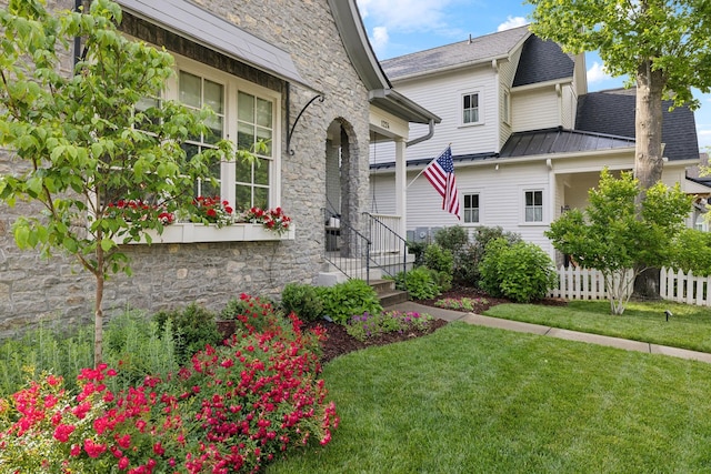 1224 Adams St, Franklin, TN 37064 - view of front facade with stone siding, a standing seam roof, and metal roof