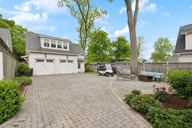 1224 Adams St, Franklin, TN 37064 - view of patio / terrace with an outdoor living space, fence, and driveway
