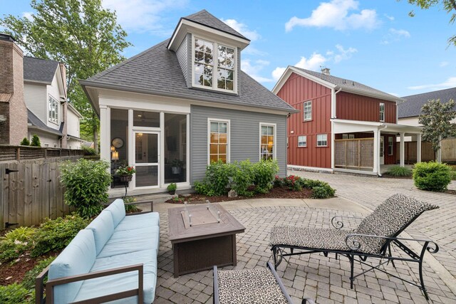 1224 Adams St, Franklin, TN 37064 - back of house featuring a shingled roof, a sunroom, a patio, fence, and outdoor lounge area