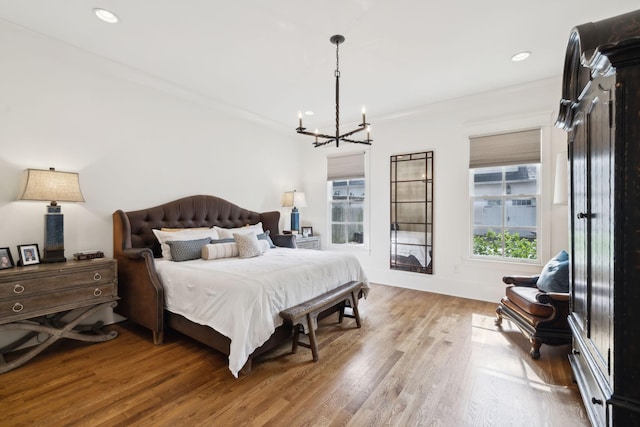 1224 Adams St, Franklin, TN 37064 - bedroom with a chandelier, wood finished floors, crown molding, and recessed lighting