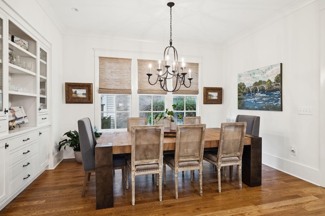 1224 Adams St, Franklin, TN 37064 - dining room featuring a chandelier, dark wood-type flooring, ornamental molding, and baseboards