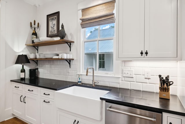 1224 Adams St, Franklin, TN 37064 - kitchen with stainless steel dishwasher, a sink, open shelves, and dark countertops