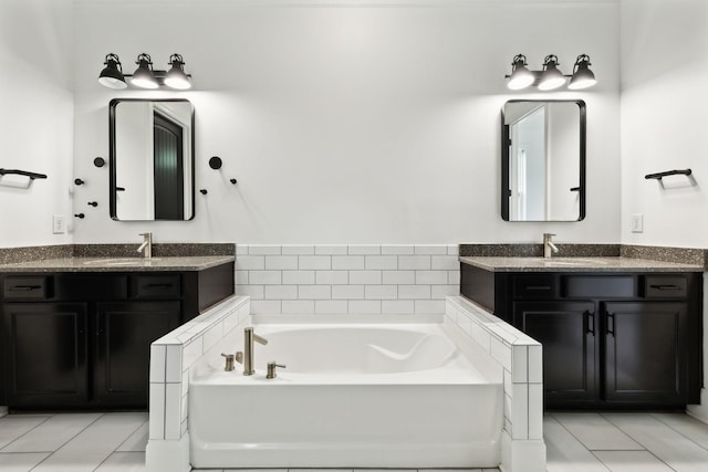 full bath with a garden tub and two vanities