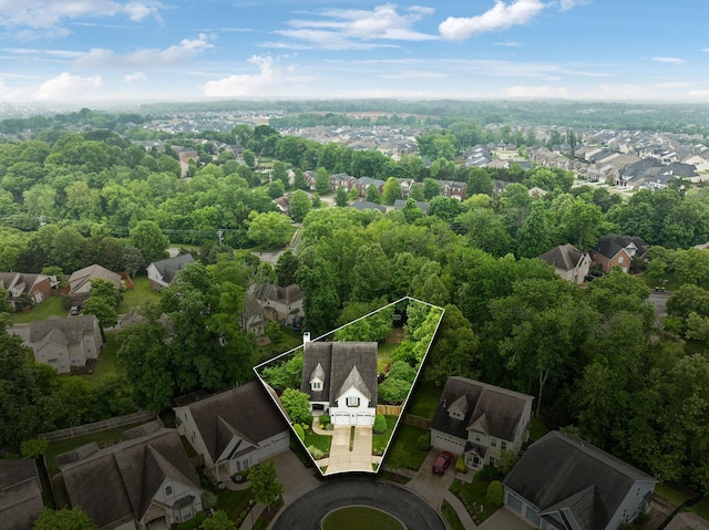 aerial perspective of suburban area with property parcel outlined