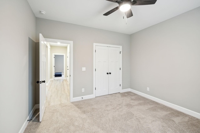 2219 Ovoca Rd, Tullahoma, TN 37388 - unfurnished bedroom featuring carpet flooring, baseboards, a closet, and ceiling fan