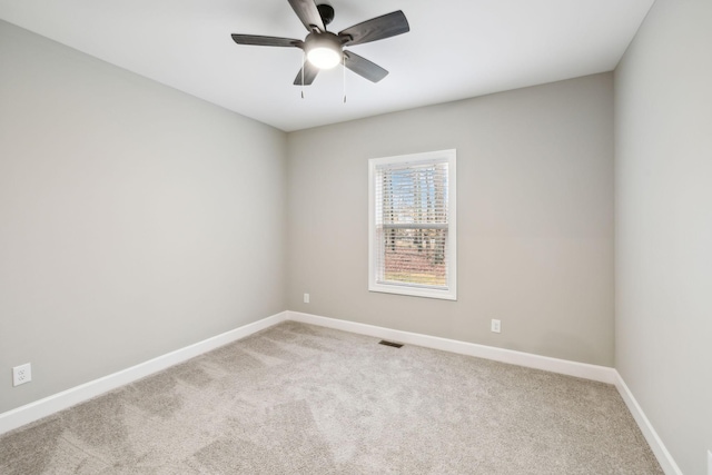 2219 Ovoca Rd, Tullahoma, TN 37388 - carpeted spare room featuring baseboards and a ceiling fan