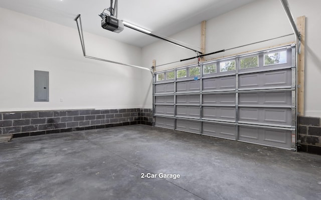 222 Grayson Way, Signal Mountain, TN 37377 - garage featuring electric panel, a garage door opener, and concrete block wall