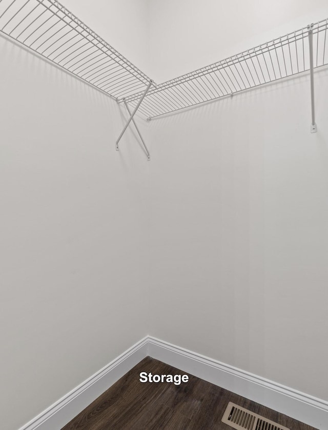 222 Grayson Way, Signal Mountain, TN 37377 - walk in closet with dark wood-style flooring