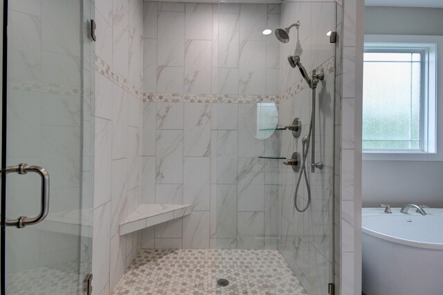 864 S Ridge Trl, Clarksville, TN 37043 - full bath featuring a stall shower and a freestanding tub