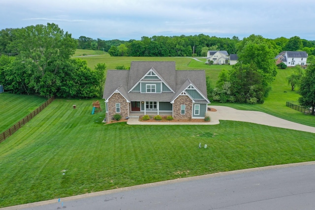 864 S Ridge Trl, Clarksville, TN 37043 - craftsman house featuring covered porch, concrete driveway, and a front lawn