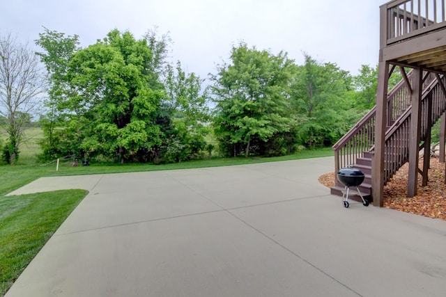 864 S Ridge Trl, Clarksville, TN 37043 - view of patio / terrace with stairway, view of scattered trees, and a deck
