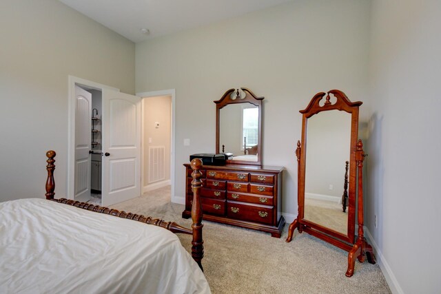 864 S Ridge Trl, Clarksville, TN 37043 - bedroom with carpet flooring, a towering ceiling, and baseboards