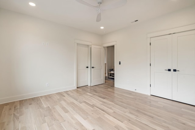 unfurnished bedroom with light wood-style floors, baseboards, recessed lighting, a closet, and a ceiling fan