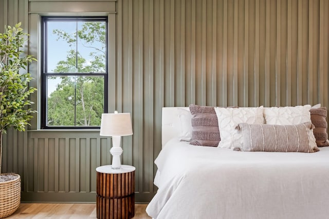 bedroom with wood finished floors
