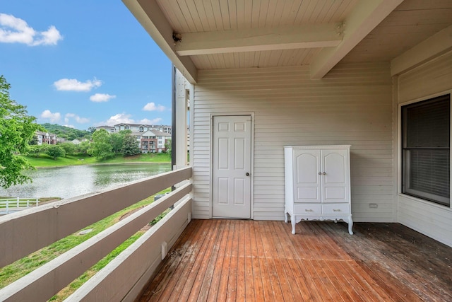 balcony featuring a water view