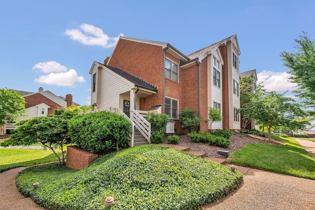 view of home's exterior featuring brick siding