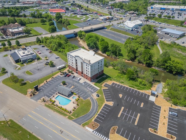 1410 Hurley Dr Unit 103, Sevierville, TN 37862 - drone / aerial view of a pool area and a nearby body of water