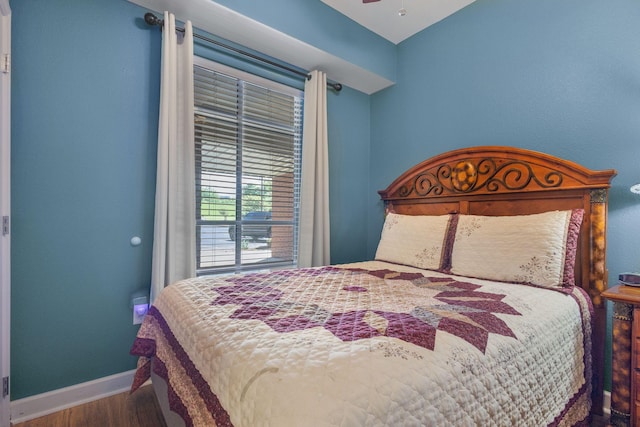1410 Hurley Dr Unit 103, Sevierville, TN 37862 - bedroom with wood finished floors, baseboards, and a ceiling fan